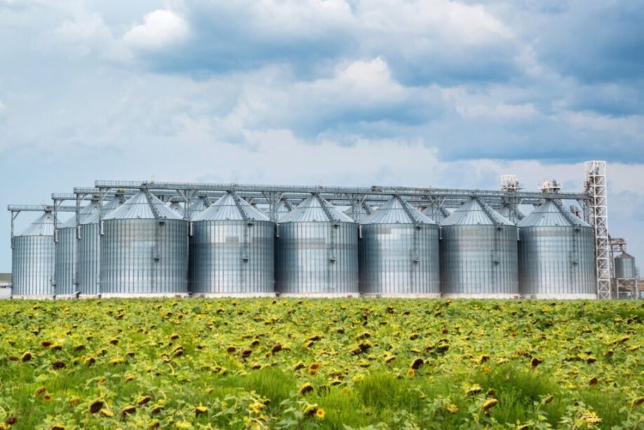 A group of grain silos is monitored using IoT level monitoring.