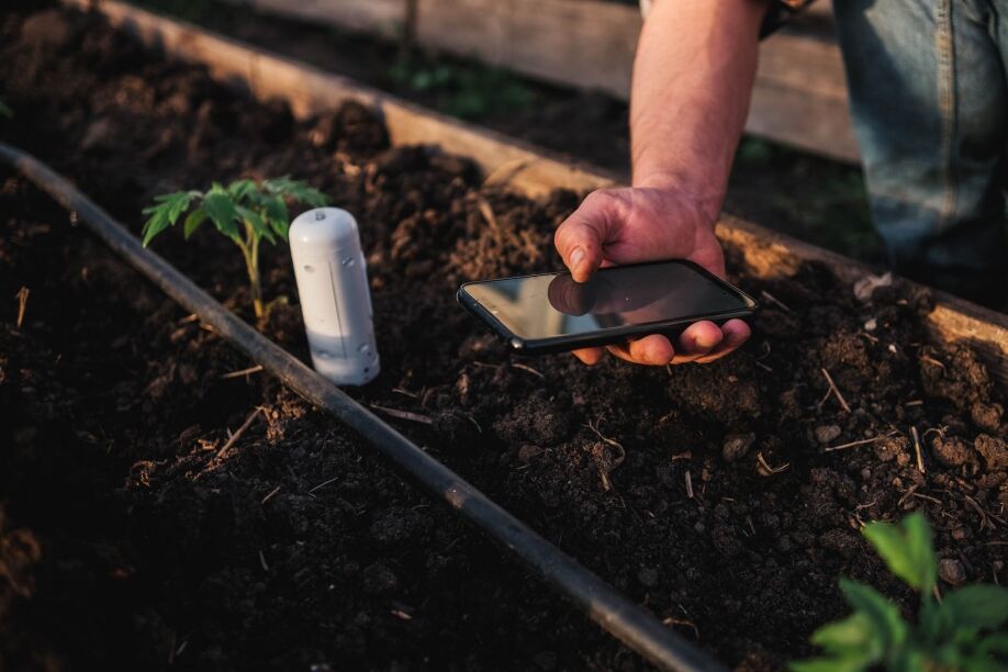 Sensors and actuators help a farmer monitor crops.